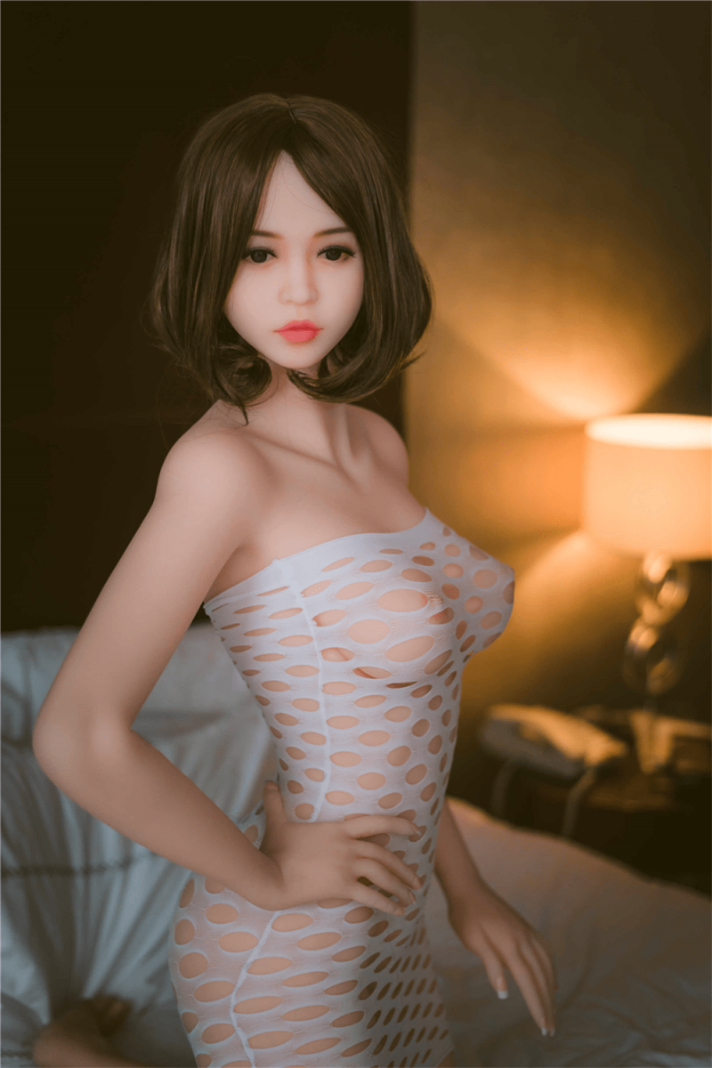 Cute Sex Doll With A Fork On The Waist