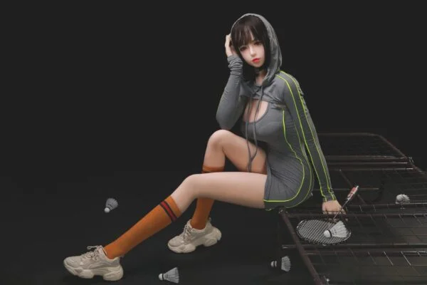 Why Do People Find Anime Sex Dolls Are Attractive Hand holding a sex doll with a hat