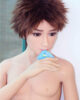 Male-sex-doll-with-condom-in-his-mouth