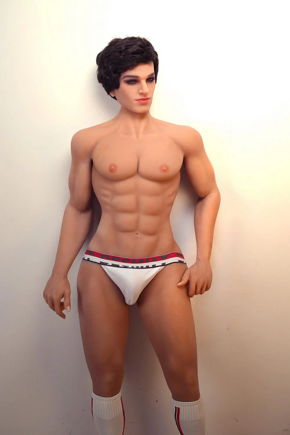 Male-sex-doll-with-hand-pinching-thigh