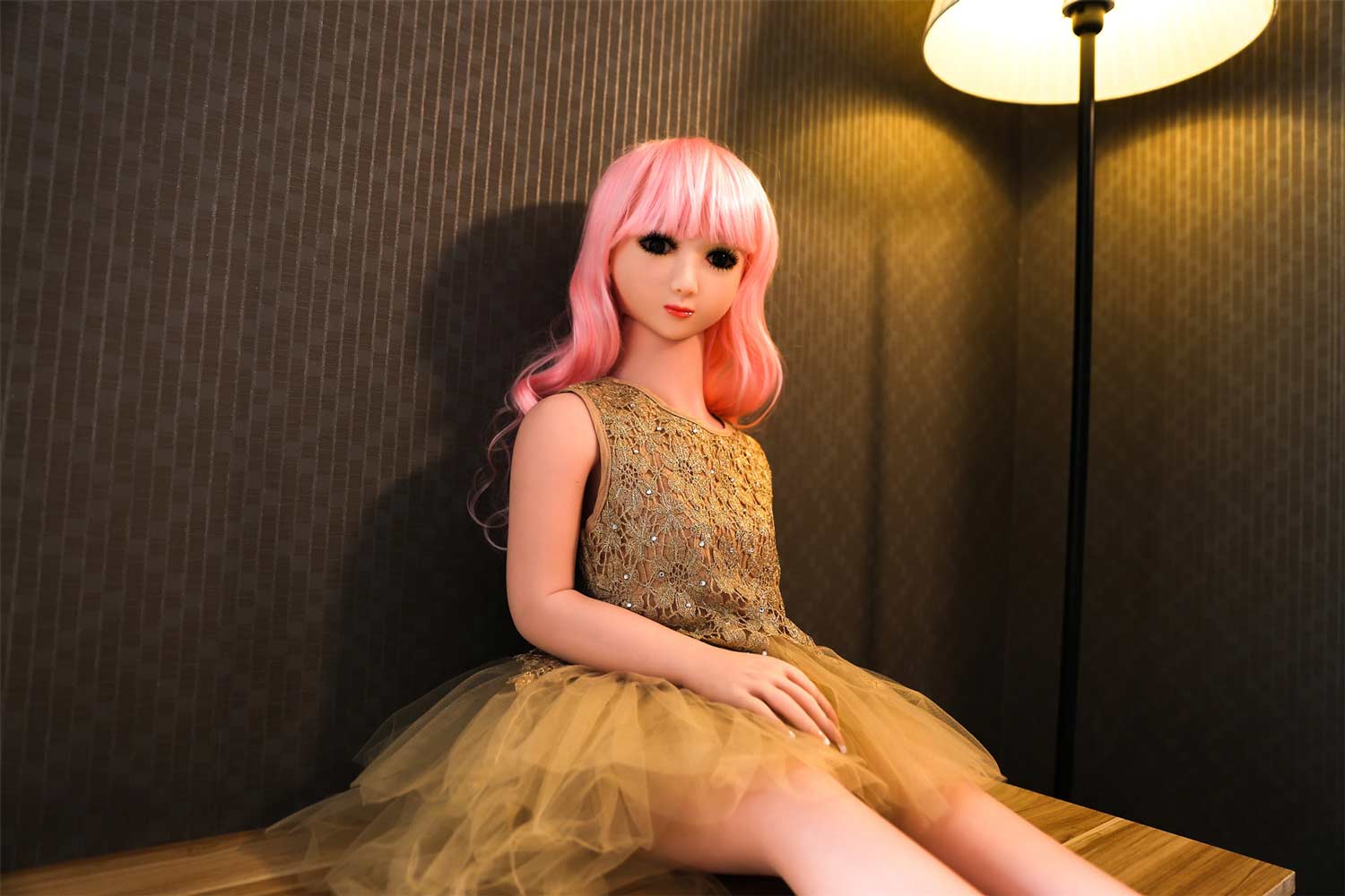 Mini sex doll with hands on skirt