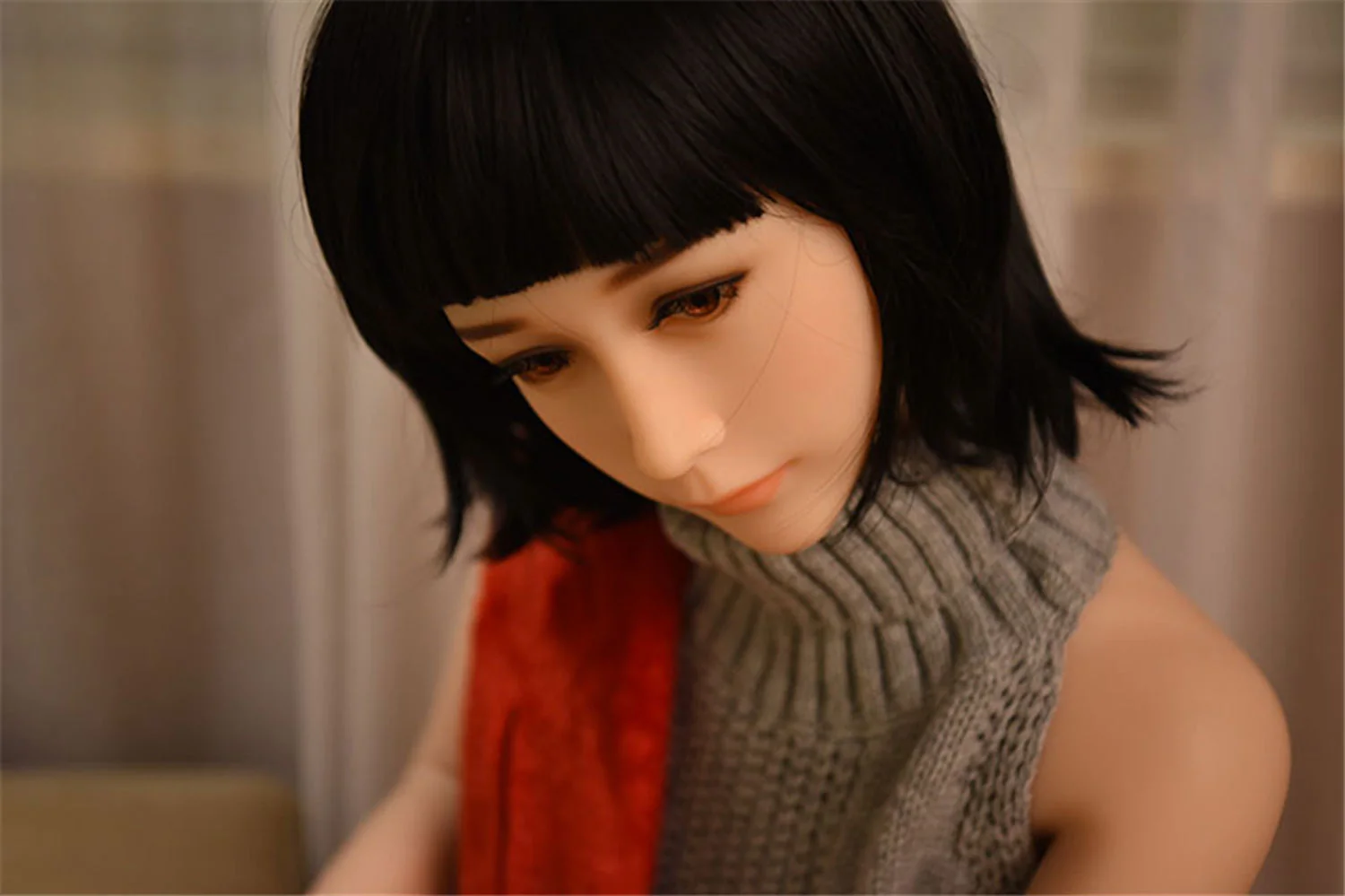 Sex doll in gray sweater