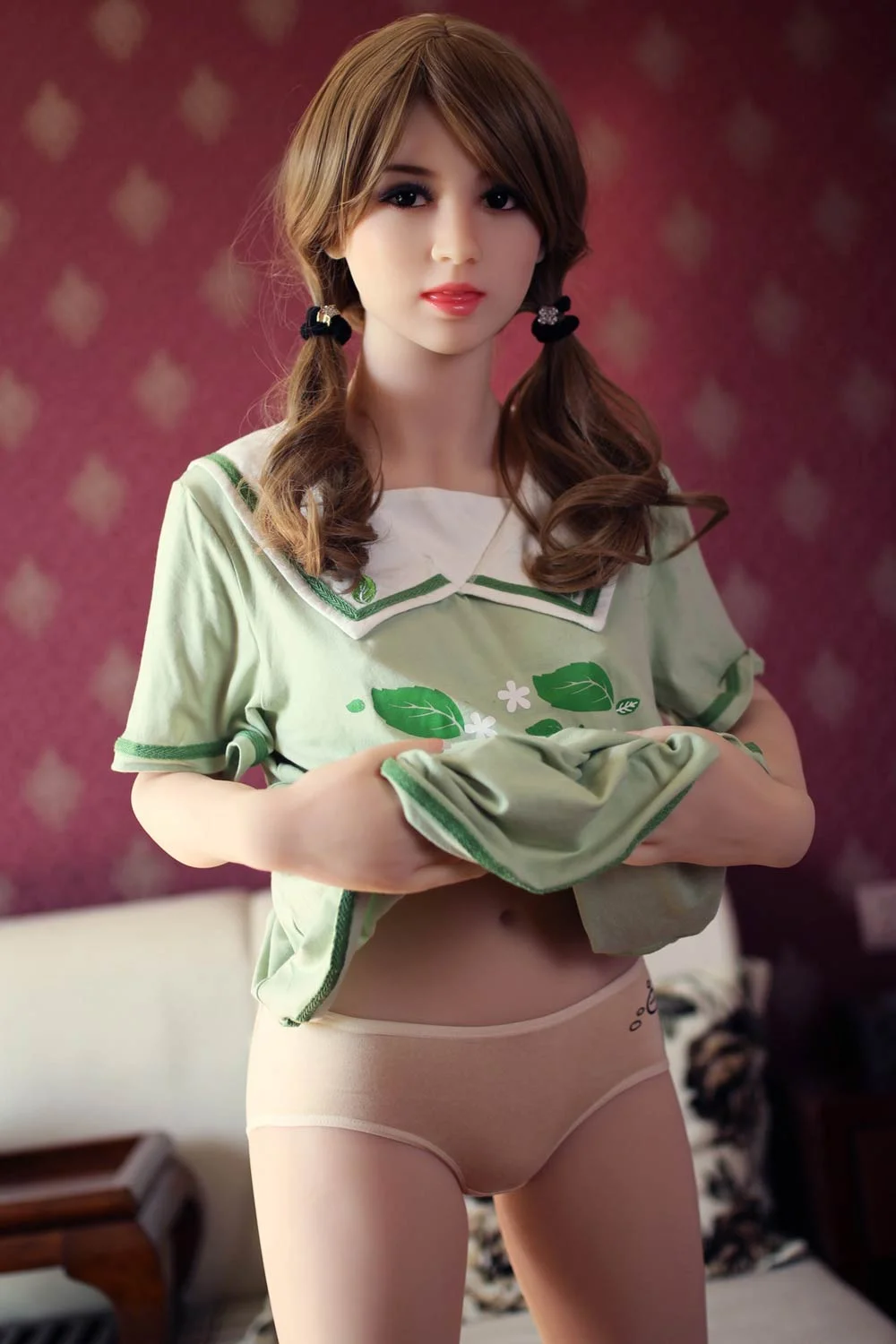 Sex doll with hands in clothes