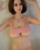 Sex doll with hands raised