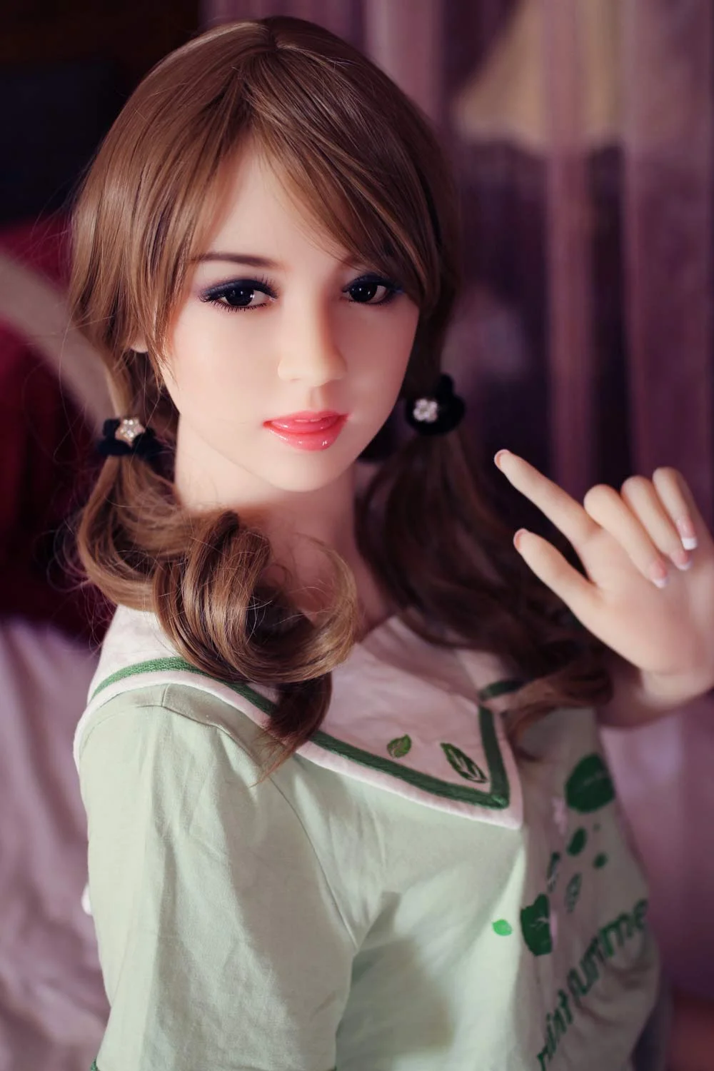 Sex doll with outstretched finger