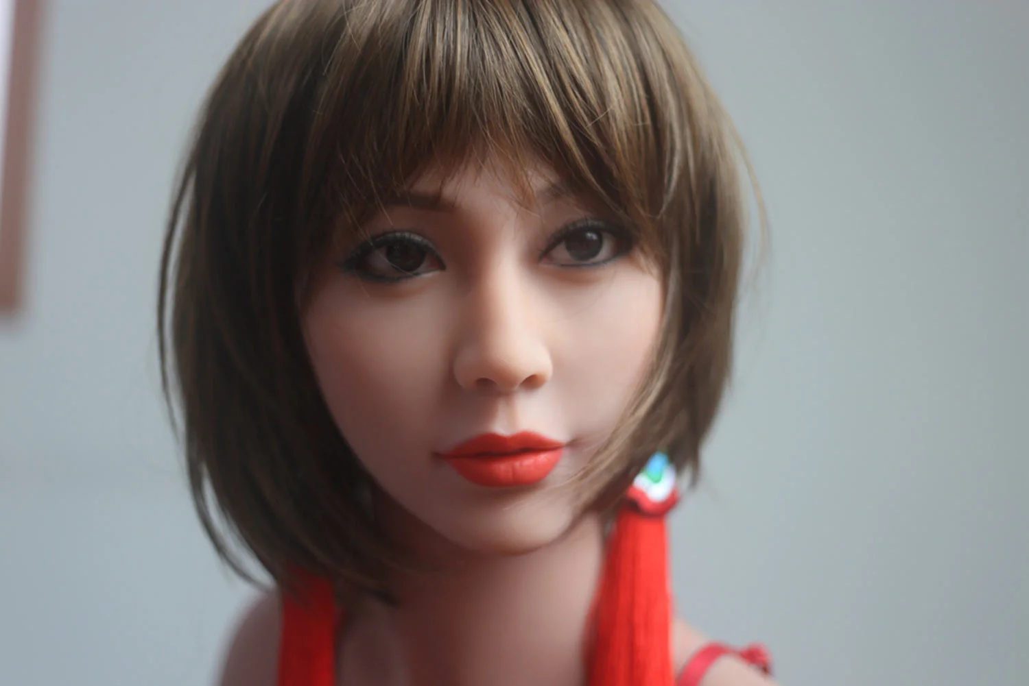 Sex doll with short brown hair