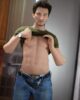 A male sex doll that lifts his clothes to reveal his chest muscles