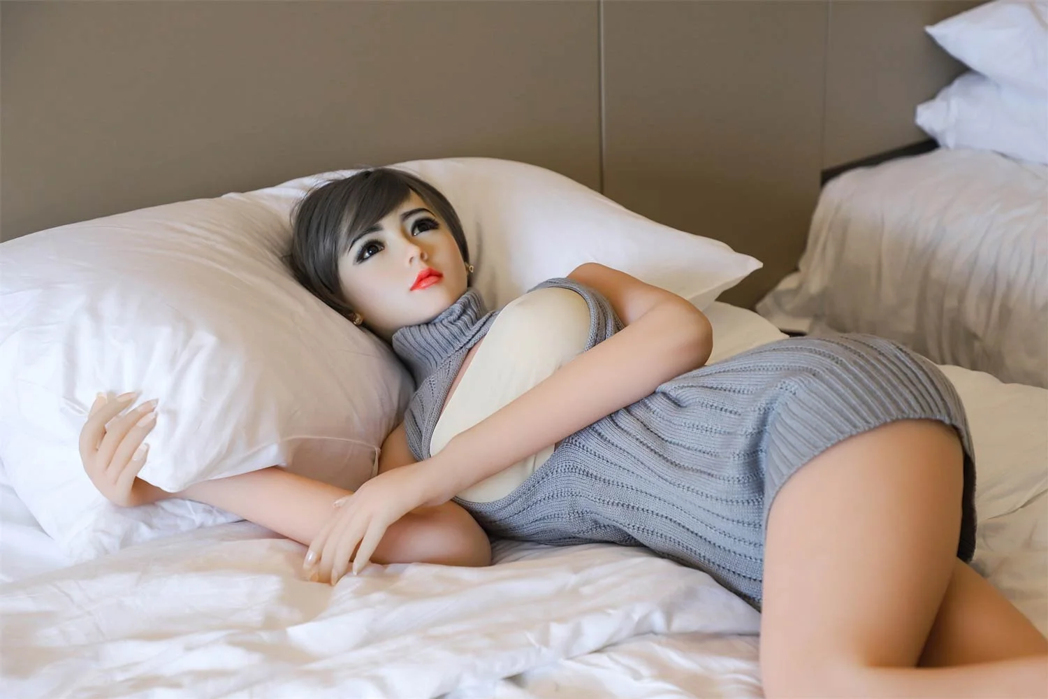 Silicone sex doll holding pillow