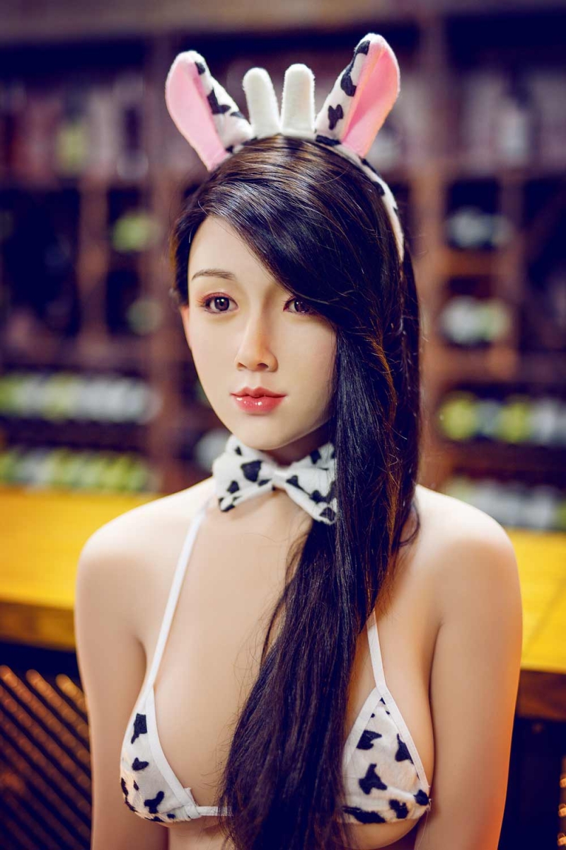 Silicone sex doll wearing cow headband