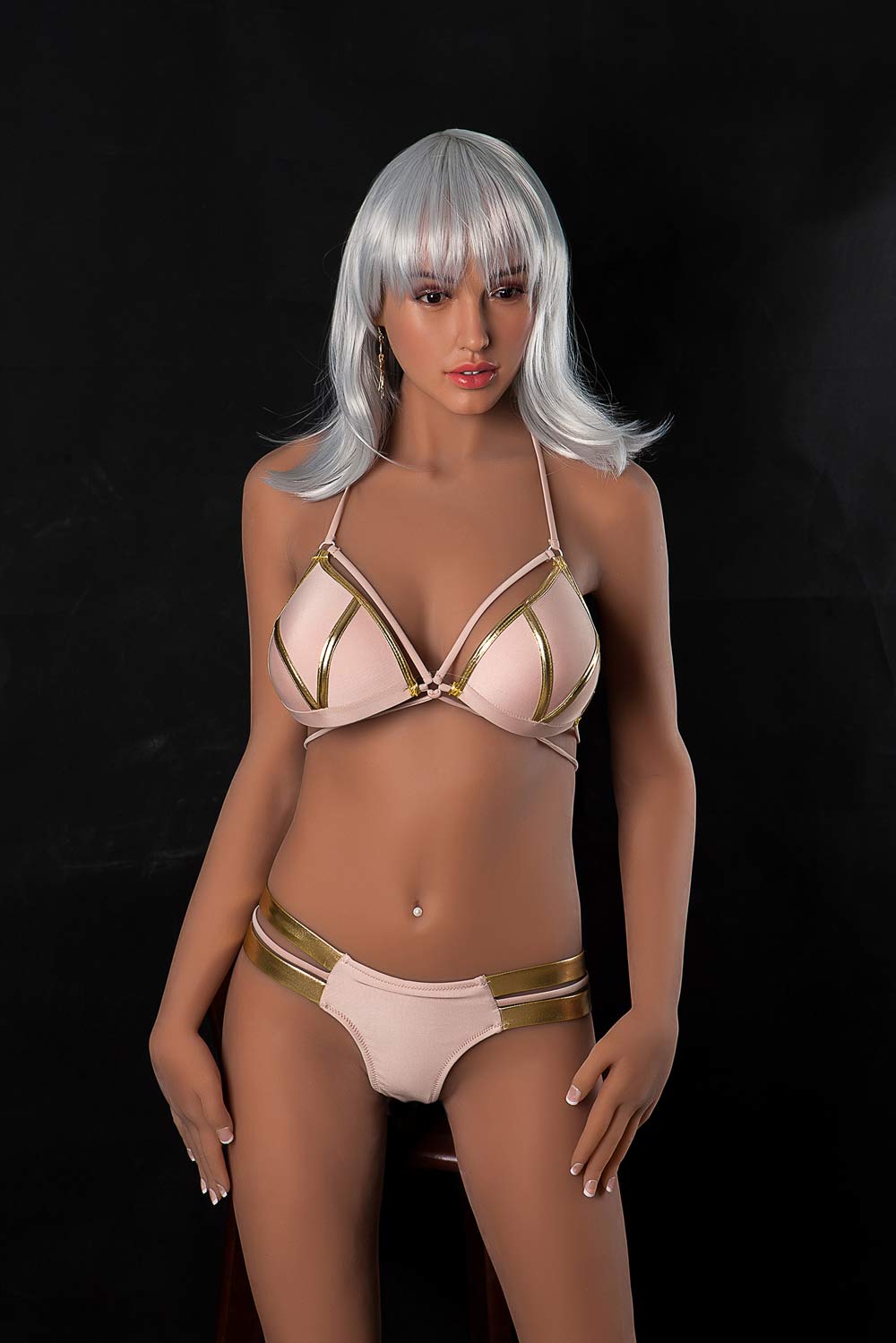 Silicone sex doll with hands on thighs