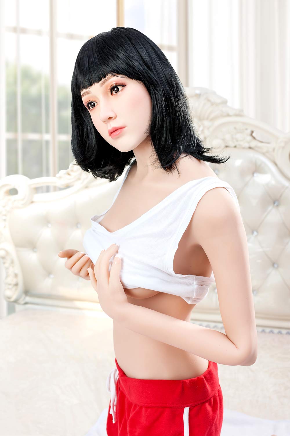 Silicone sex doll with hands touching chest