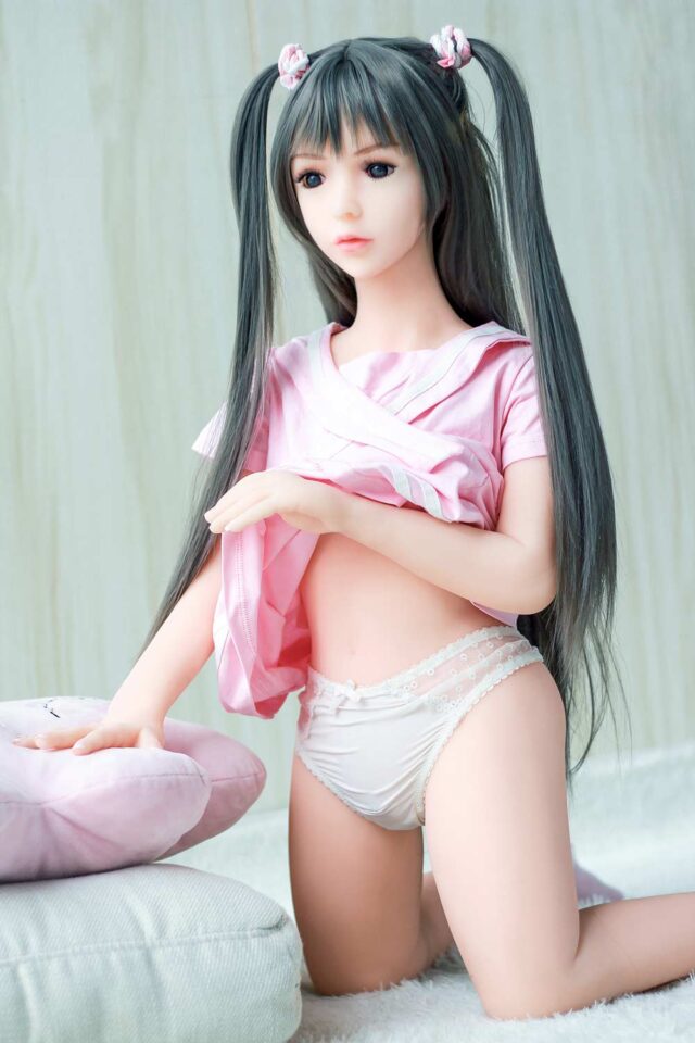 A mini sex doll that lifts up clothes and reveals panties
