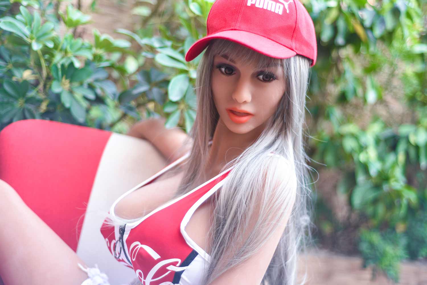 Big breasted sex doll in a red hat
