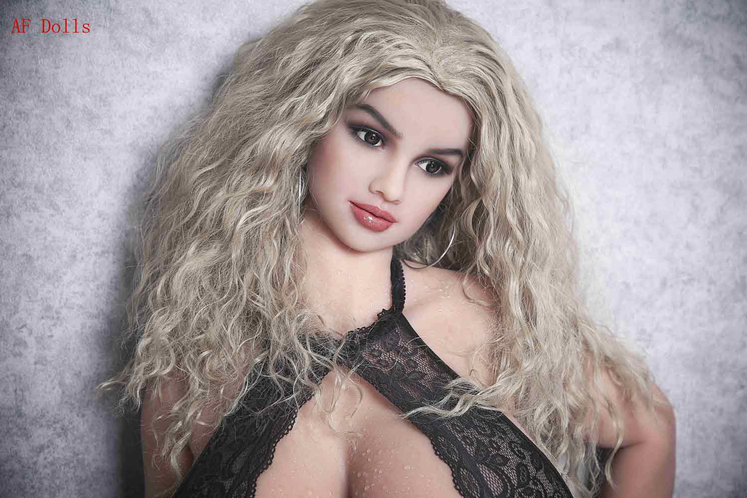 Big breasted sex doll with brown eyes