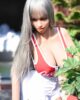Big breasted sex doll with gray long hair