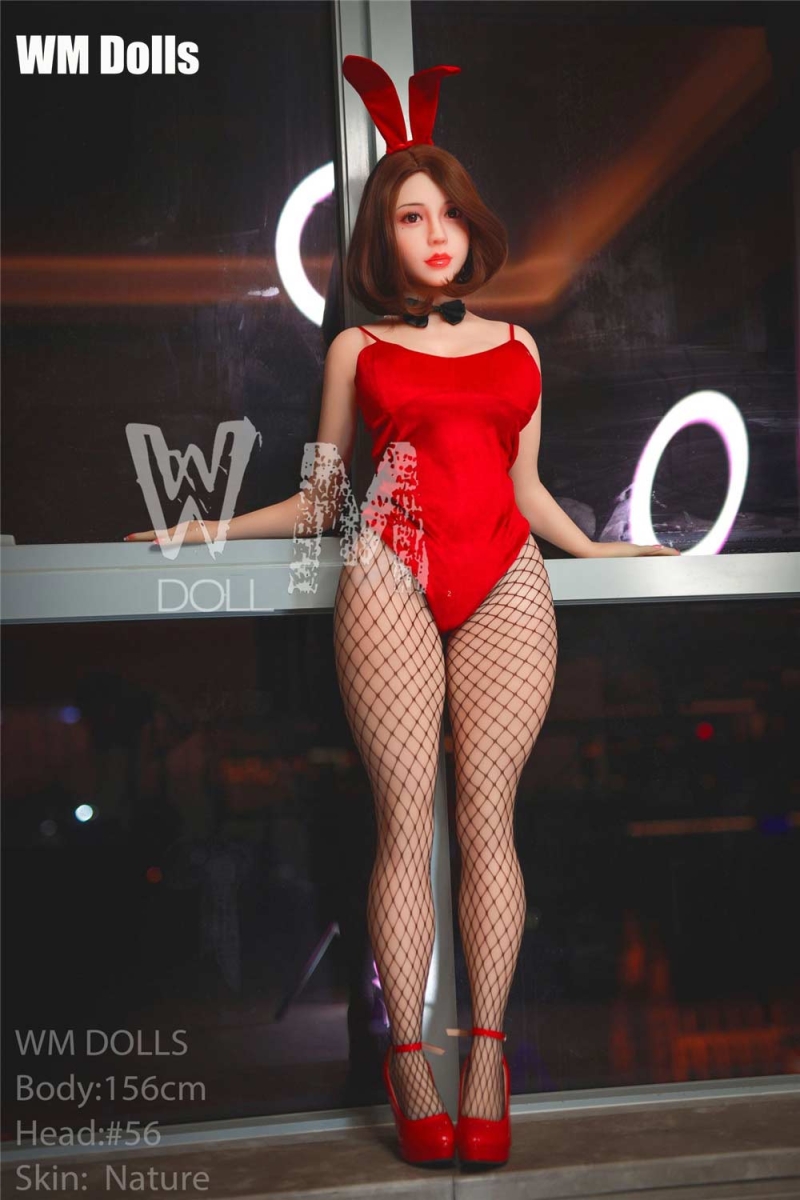 Big breasted sex doll with hands on the bar