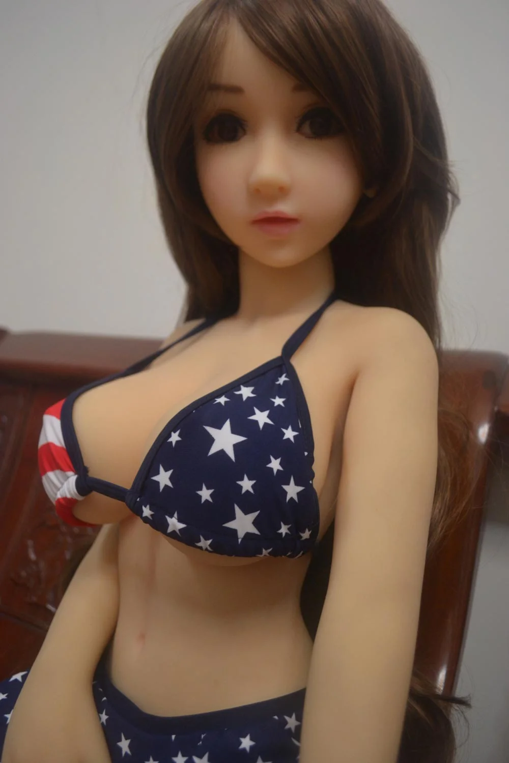 Brown haired mini sex doll