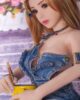 Mini sex doll holding a cup in both hands