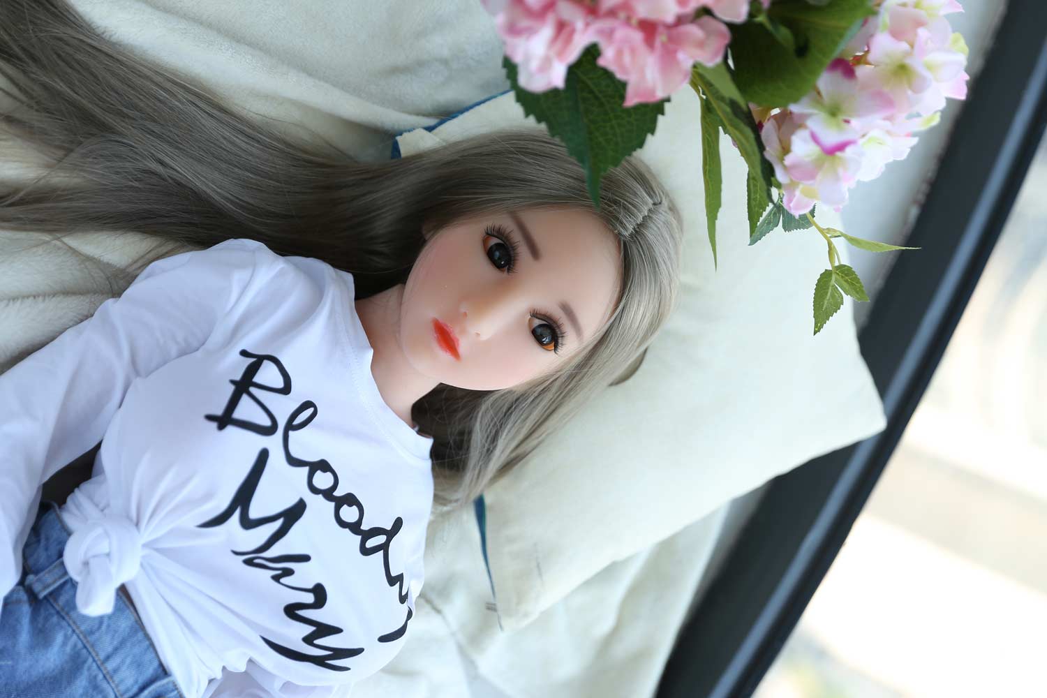 Mini sex doll in white clothes