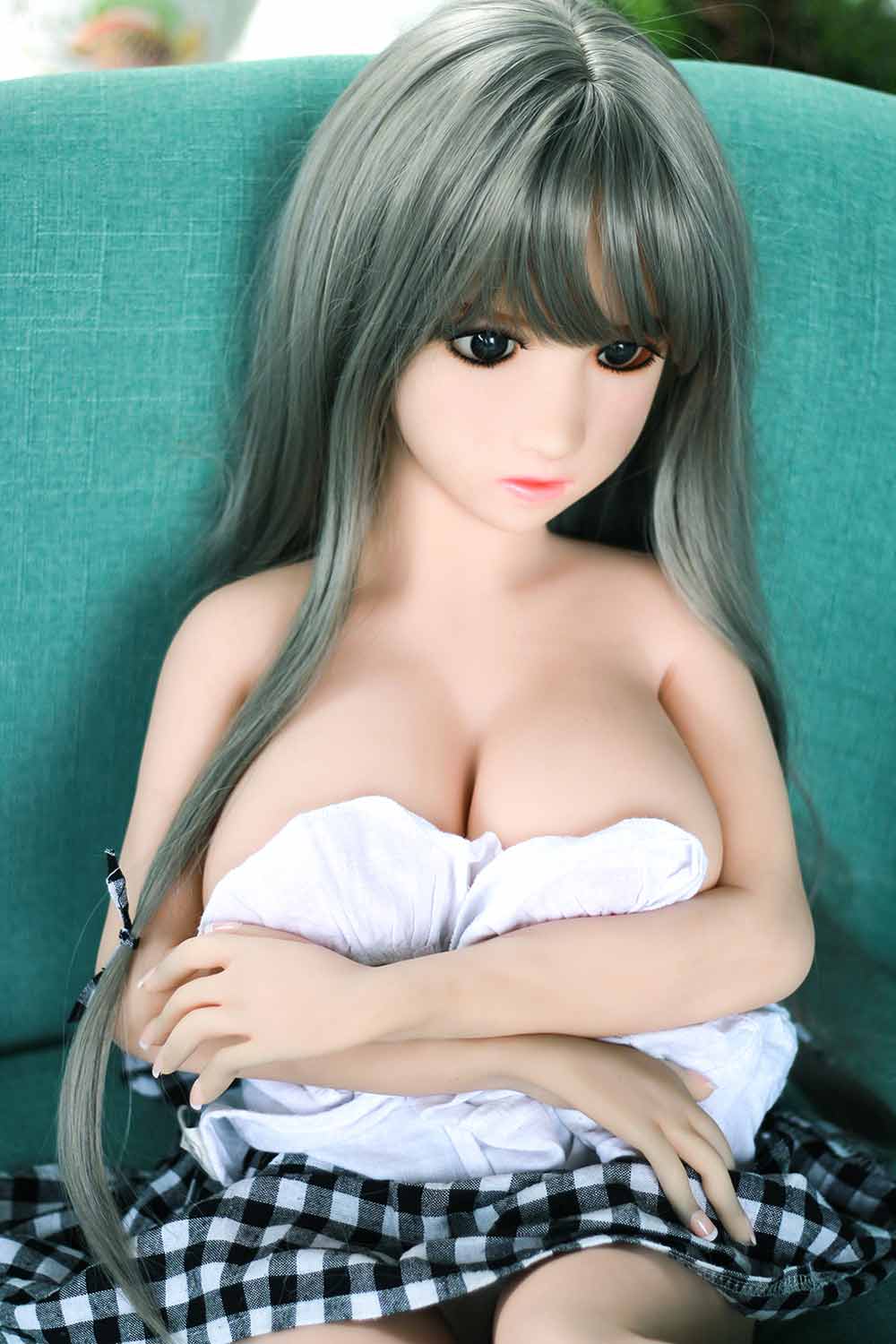 Mini sex doll with hands folded on chest