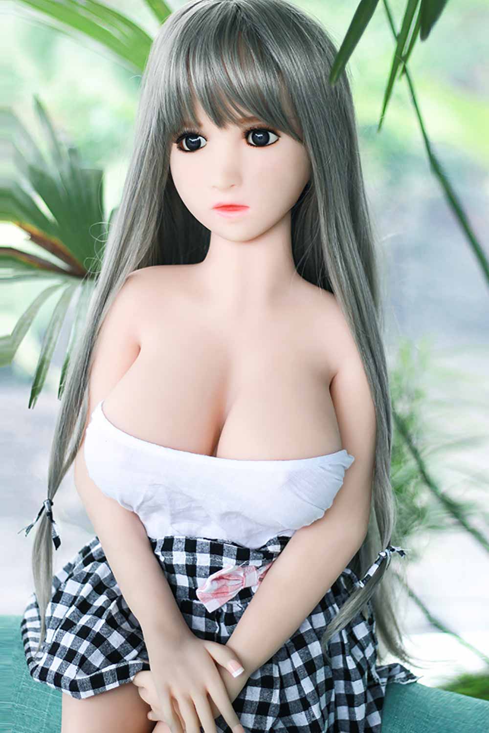 Mini sex doll with hands put together on the lower body