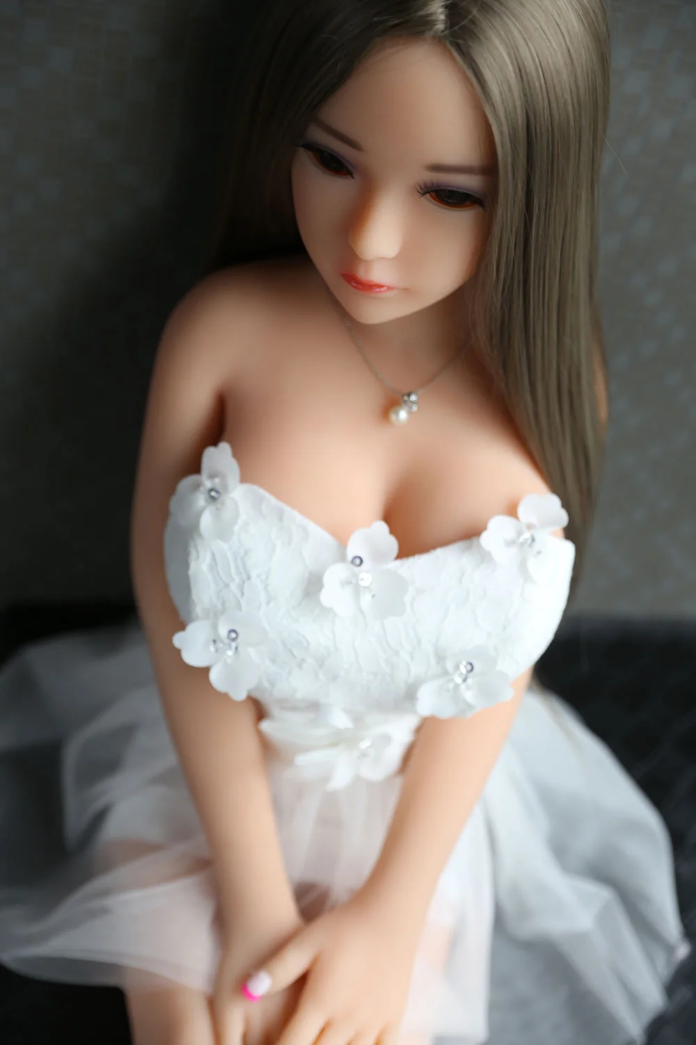 Mini sex doll with hands together
