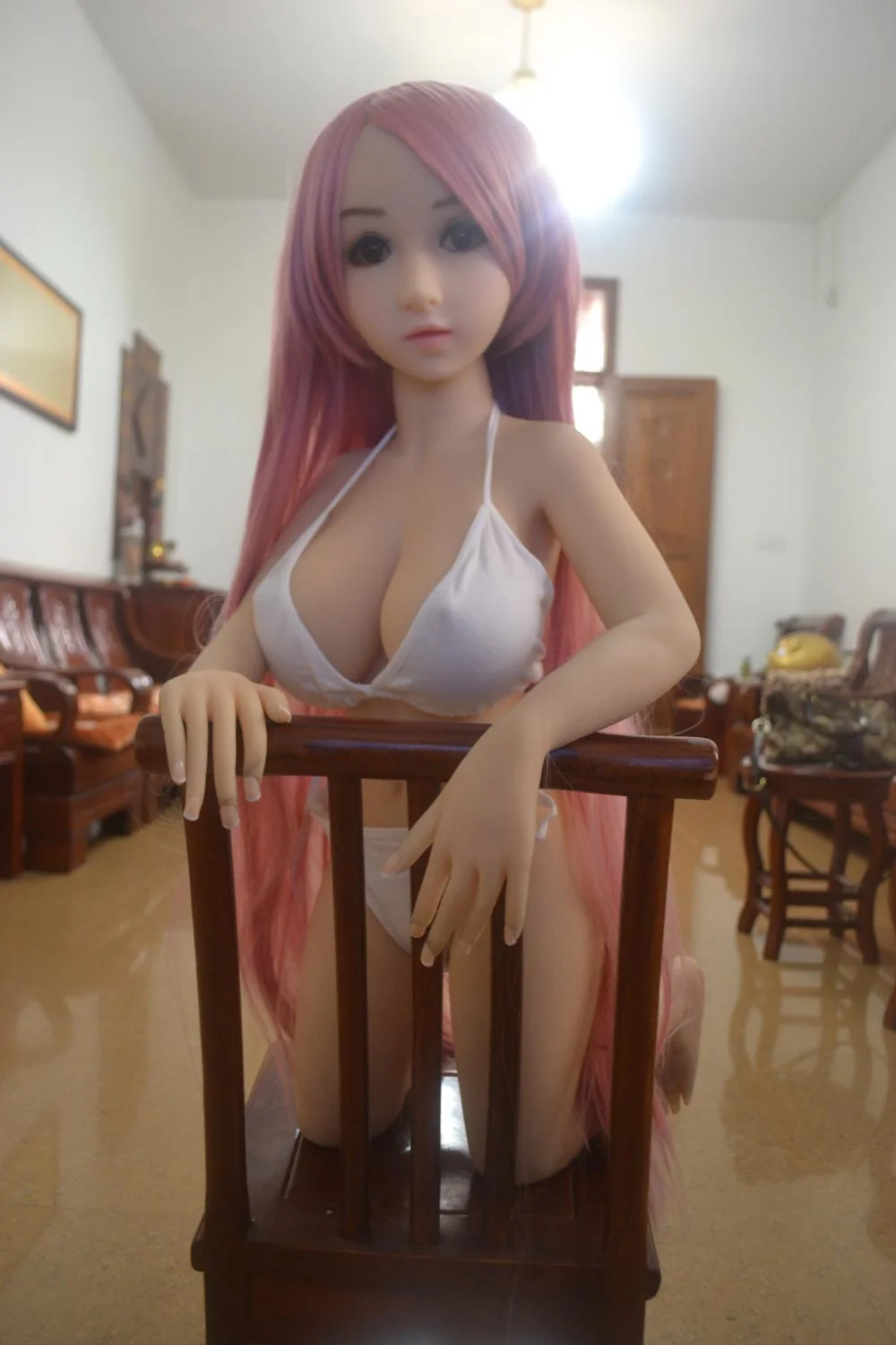 Mini sex doll with pink long hair
