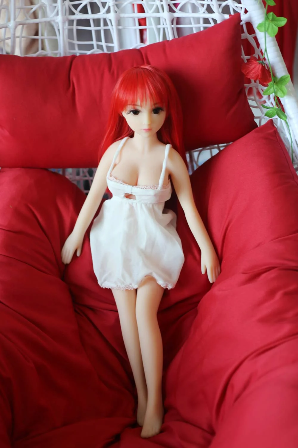 Mini sex doll with red long hair and big eyes