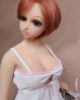 Mini sex doll with short brown hair and big eyes