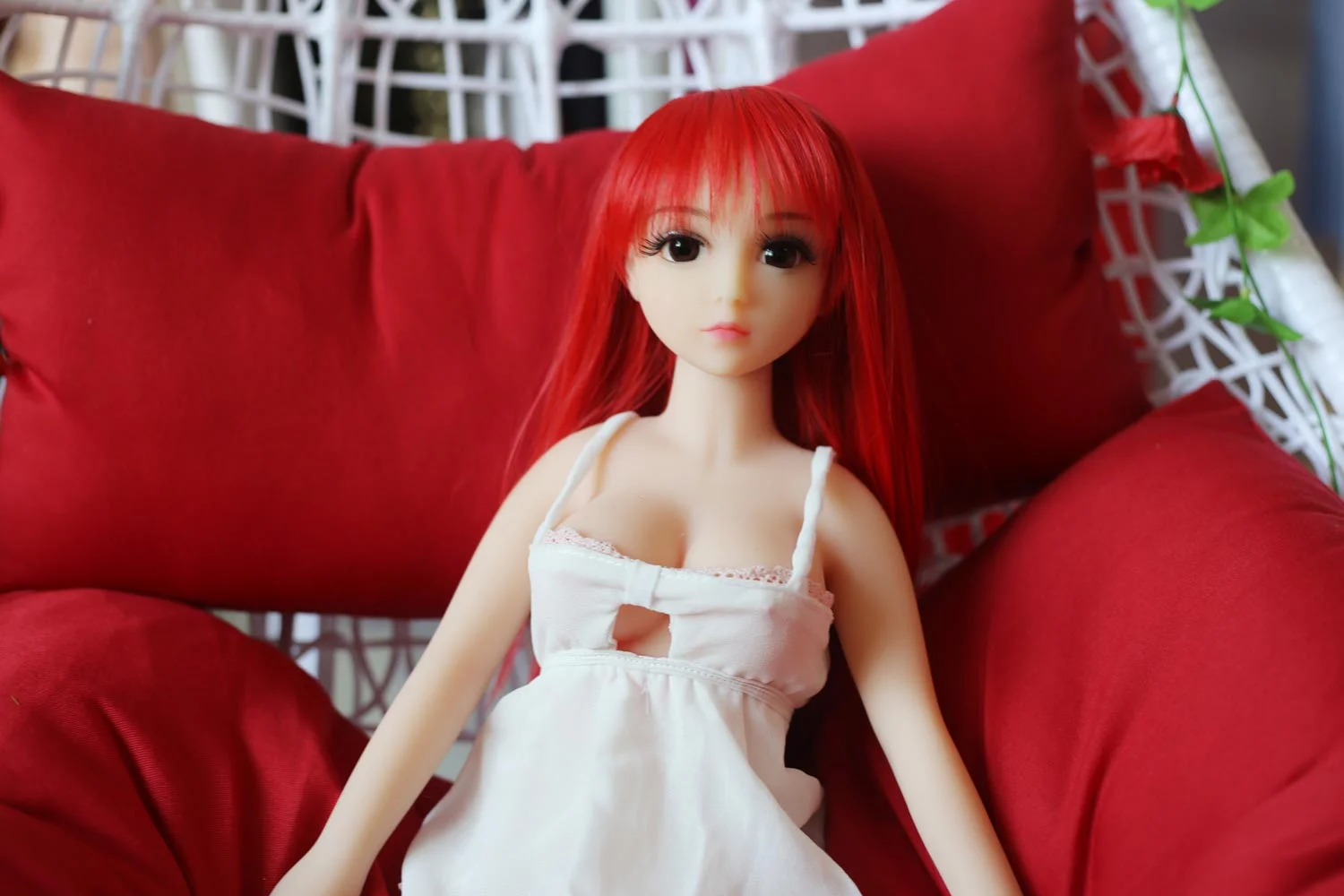 Red long-haired mini sex doll