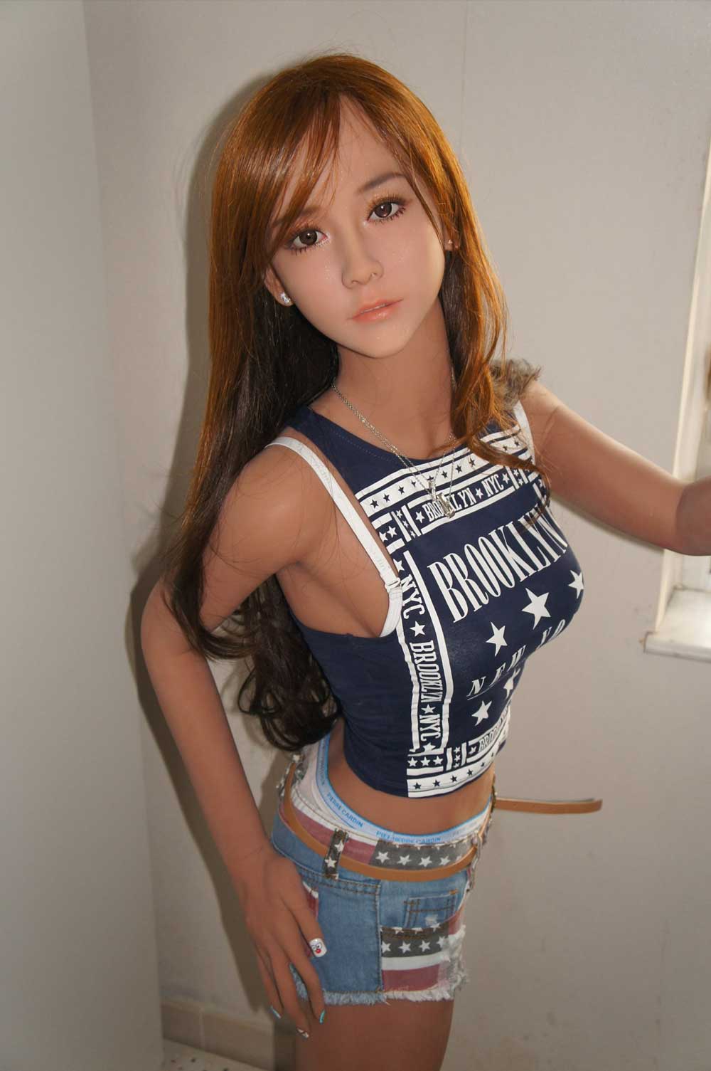 Sex doll with hands on ass