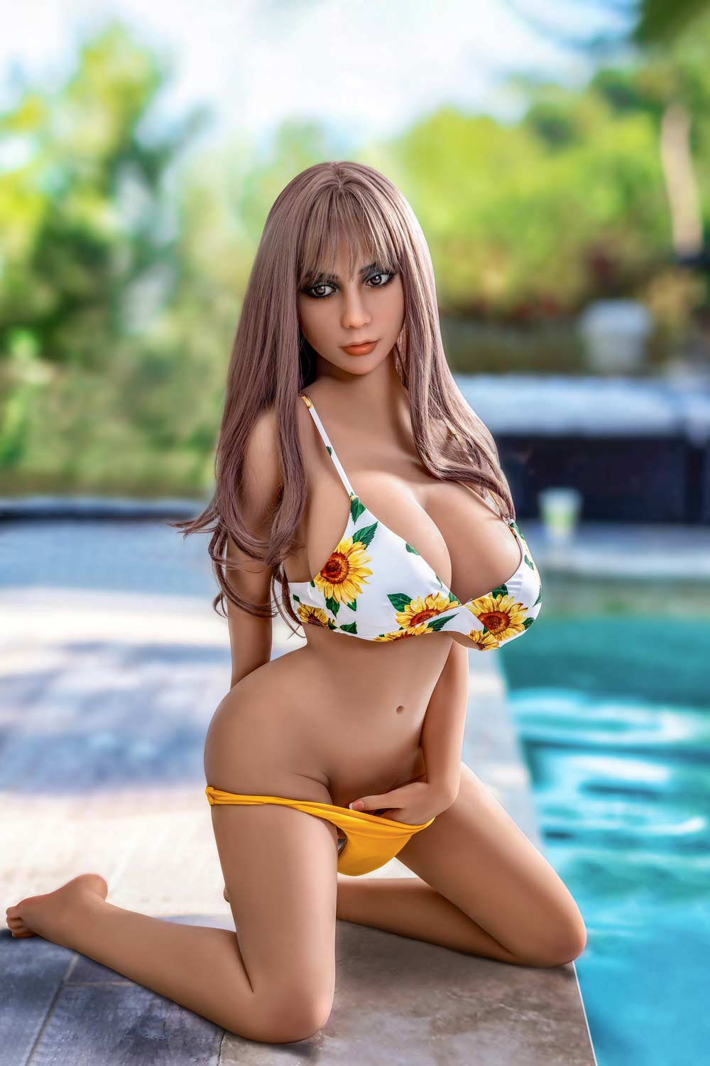 Sex doll with legs kneeling by the pool