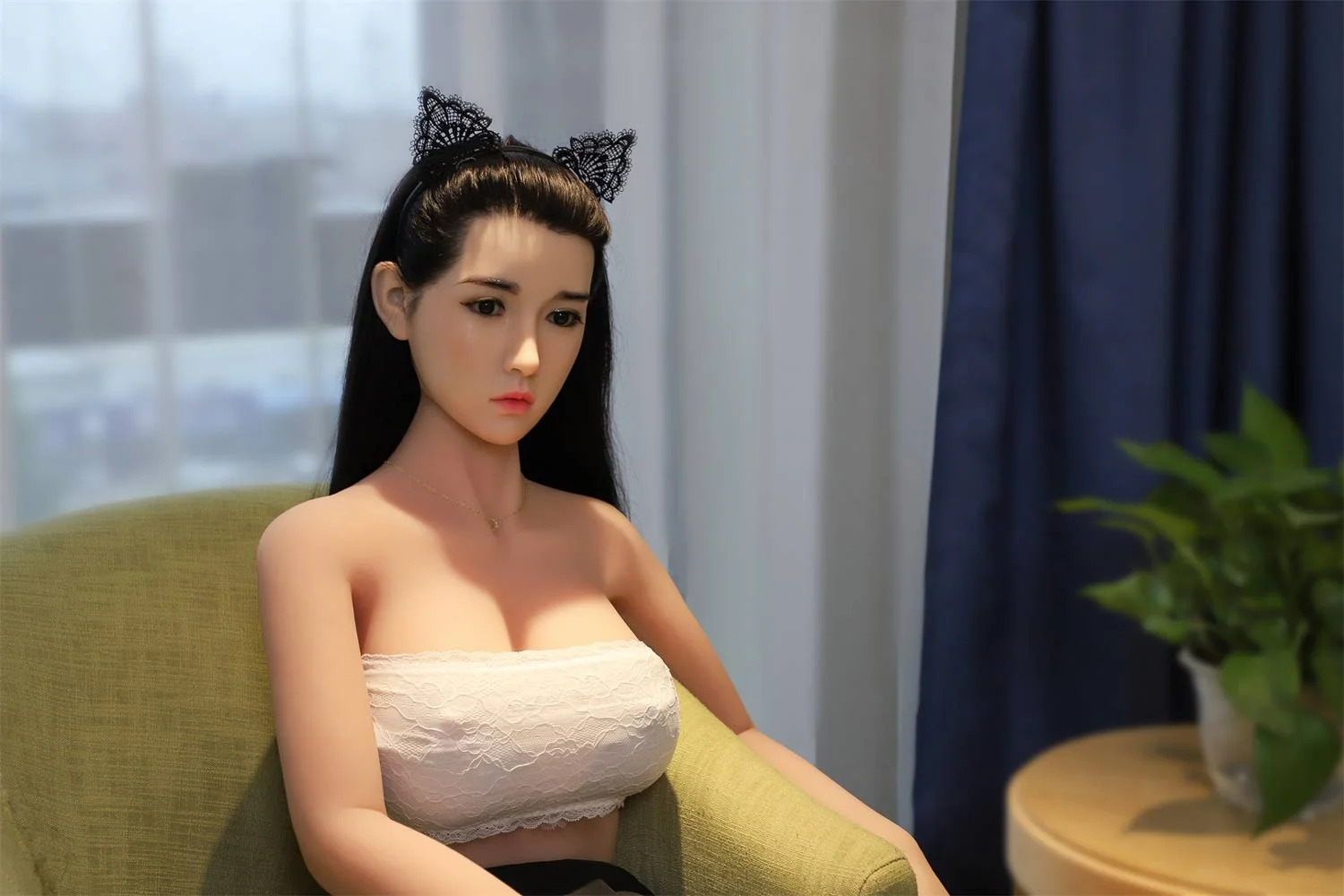 Silicone sex doll wearing a white tube top