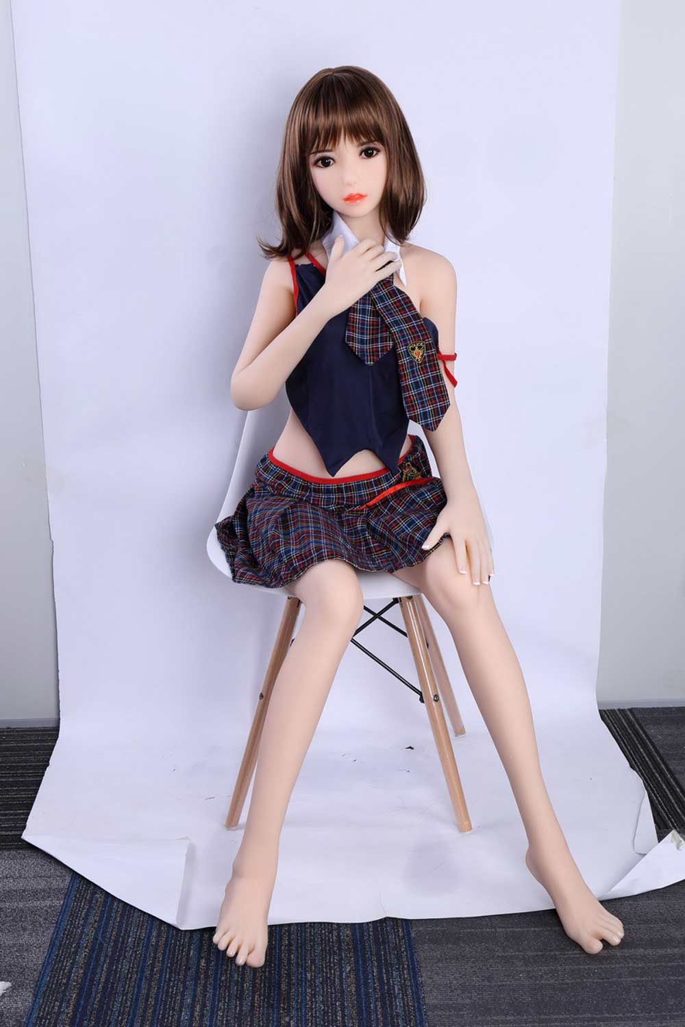 Mini sex doll with hand pull collar