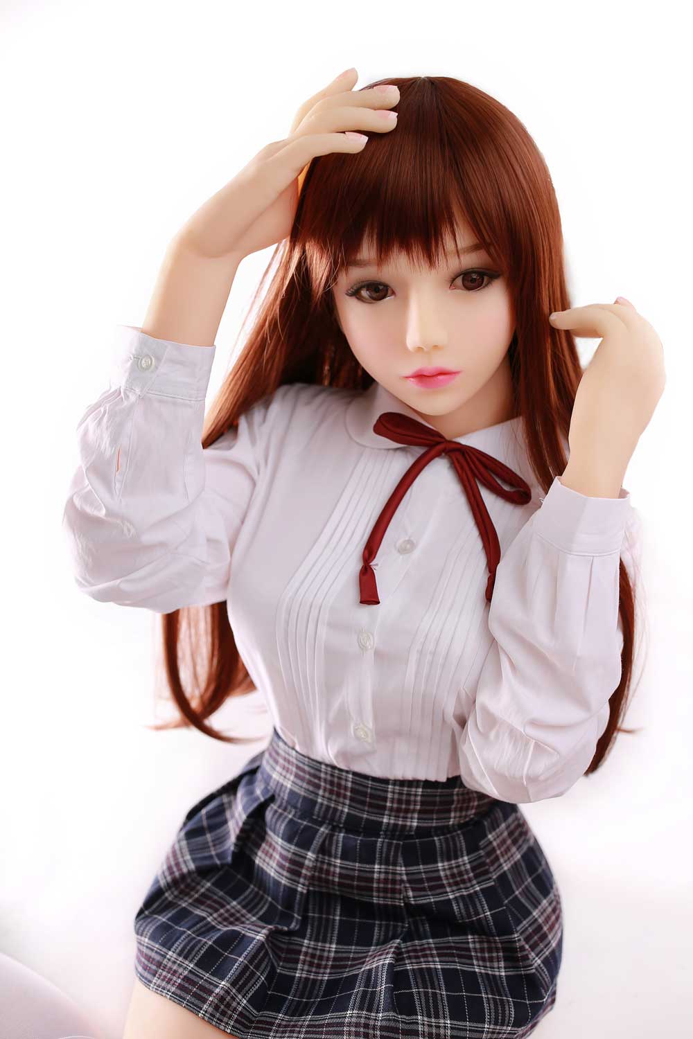 Mini sex doll with hand touching hair