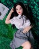 Mini sex doll with hands on belly