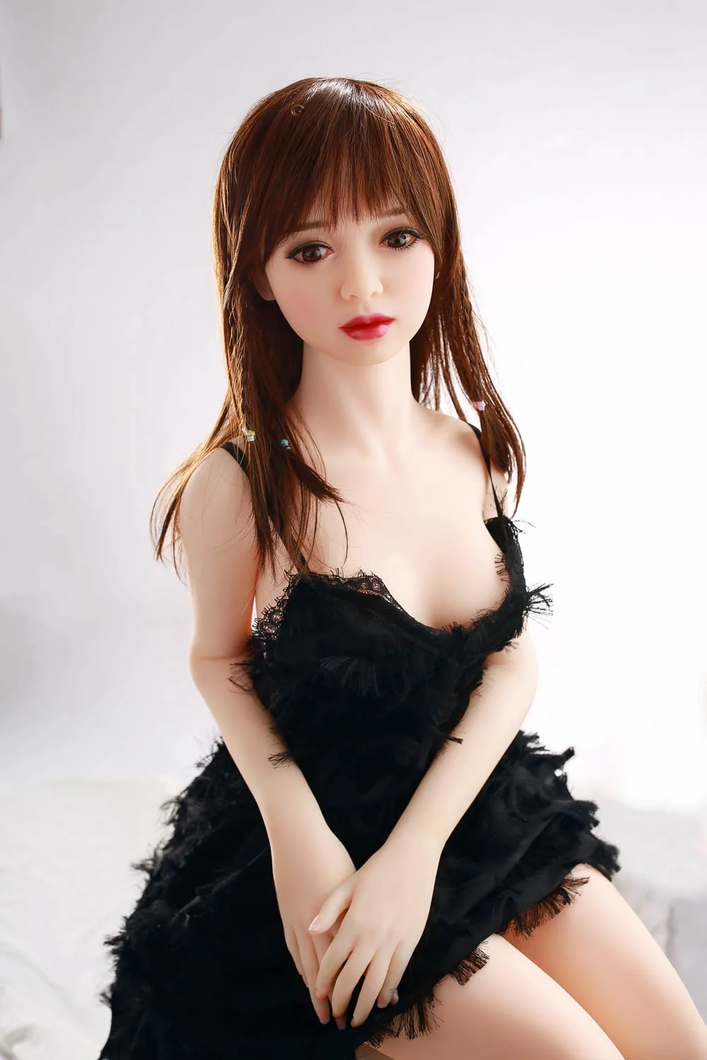 Mini sex doll with hands together
