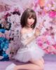 Mini sex doll with legs kneeling on the ground