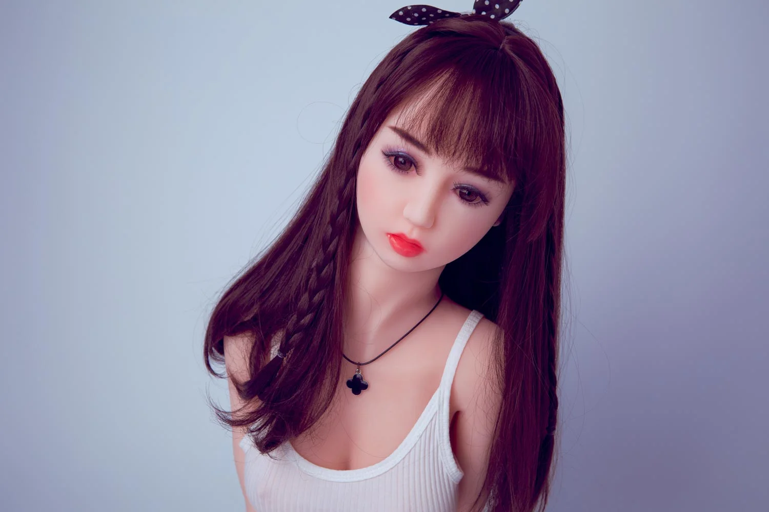 Mini sex doll with long brown hair