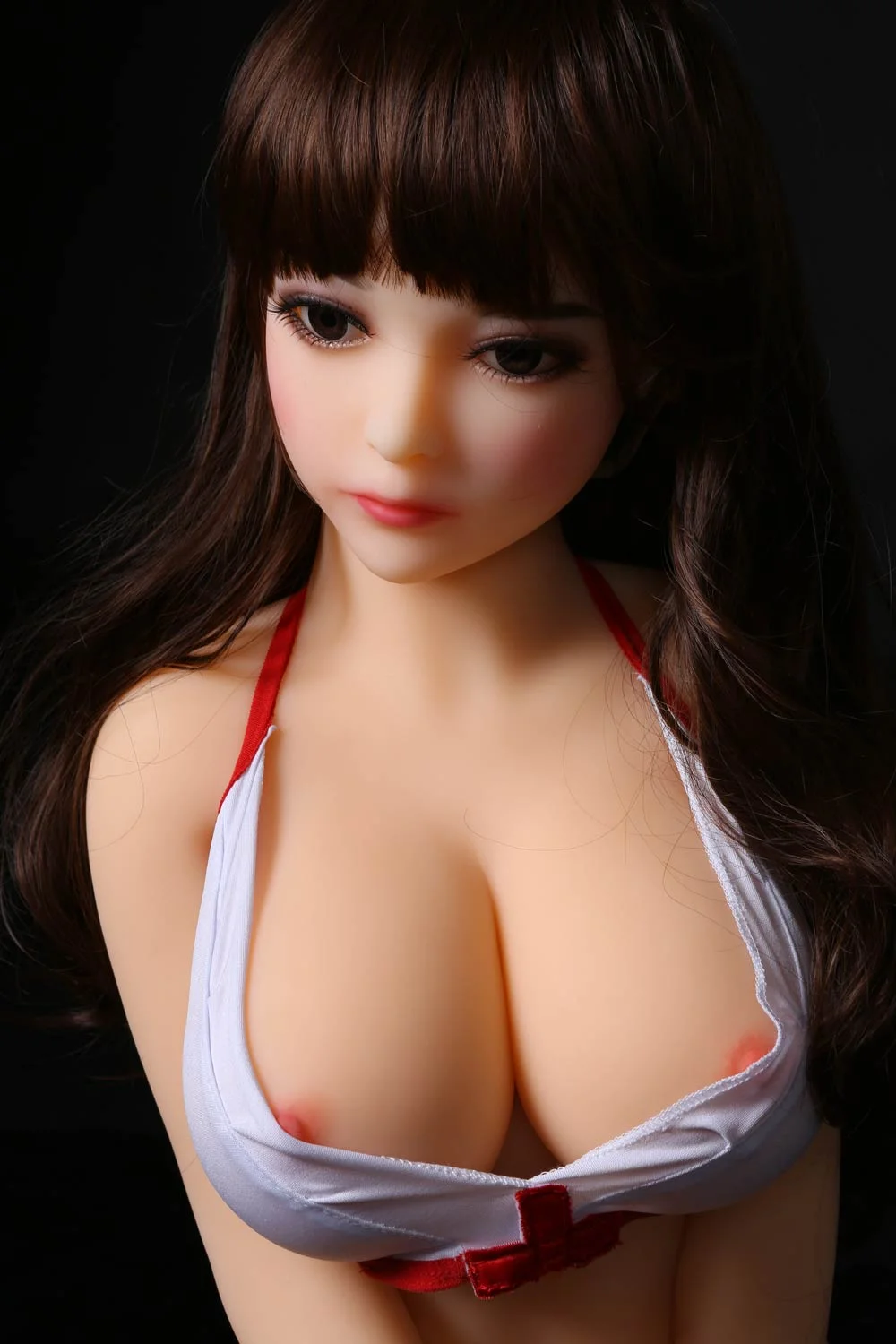 Mini sex doll with pink nipples sticking out