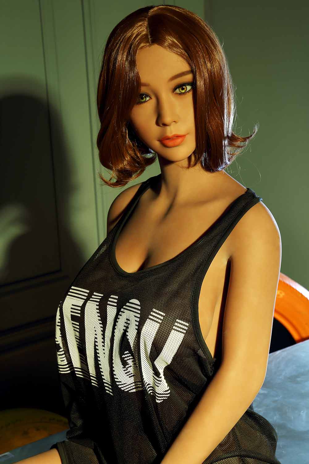 Sex doll in black baggy top