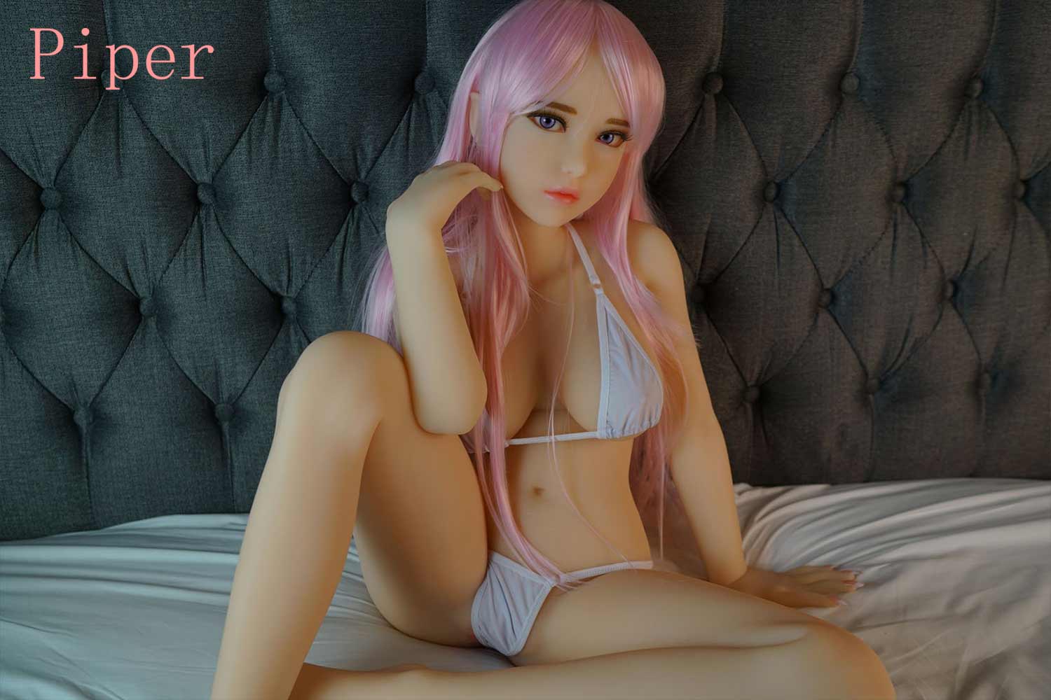 Sex doll with hand touching hair