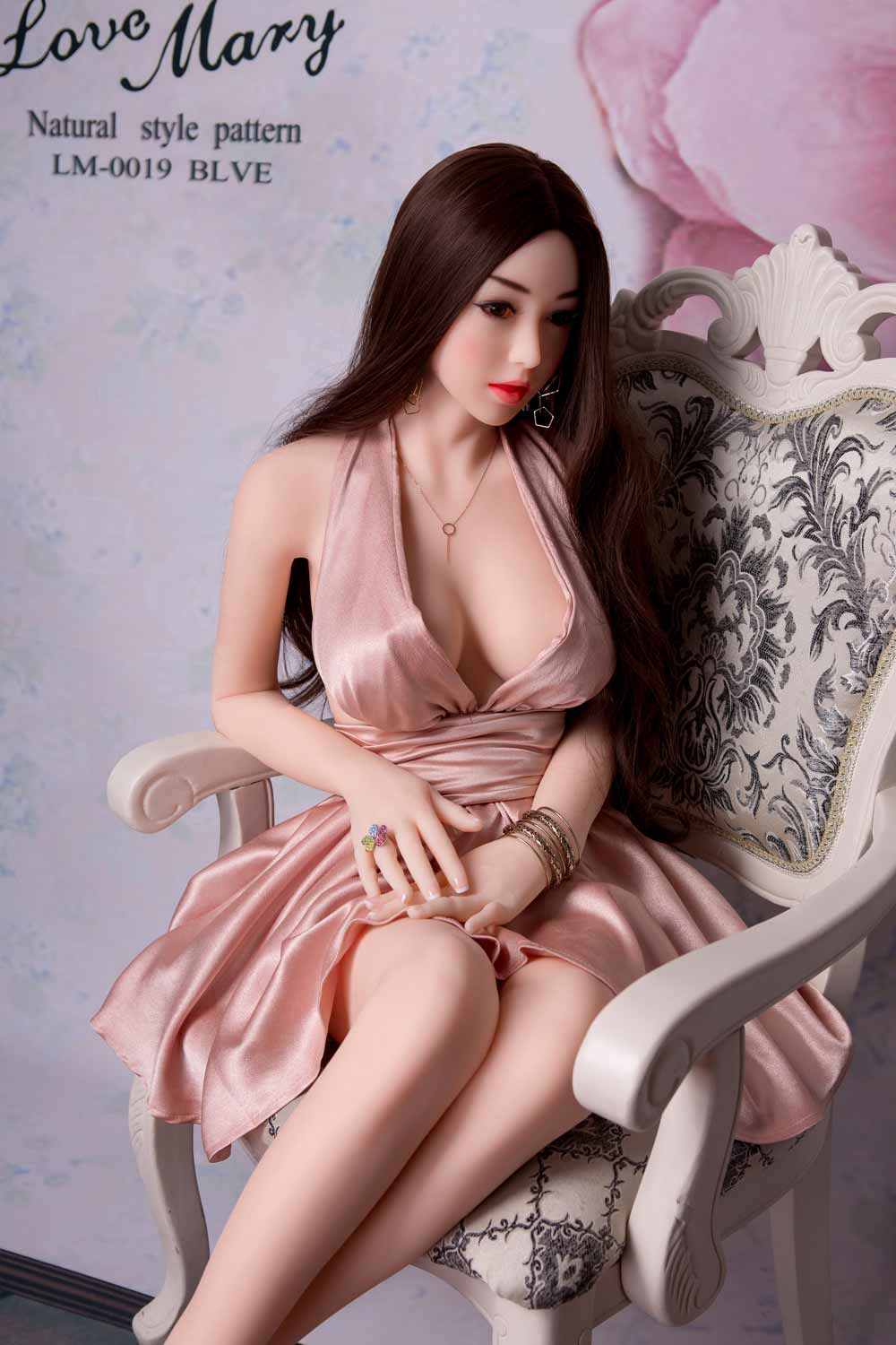 Sex doll with ring in hand