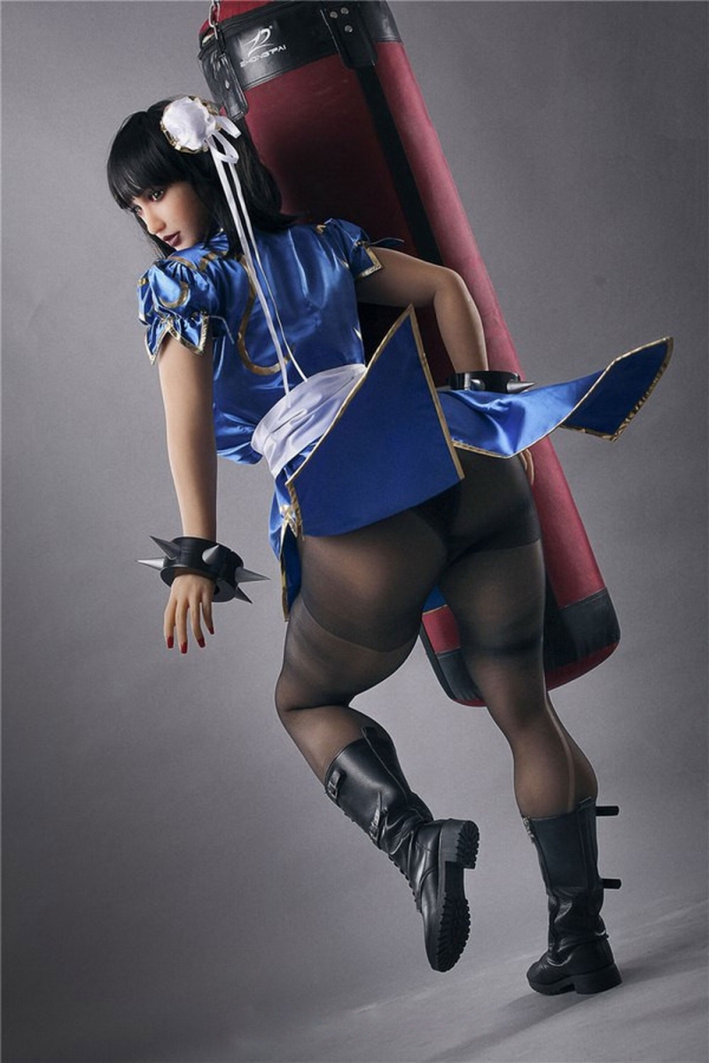 Anime sex doll lying on the boxing bag