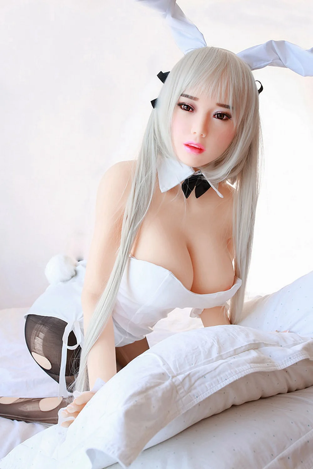 Anime sex doll lying on the pillow