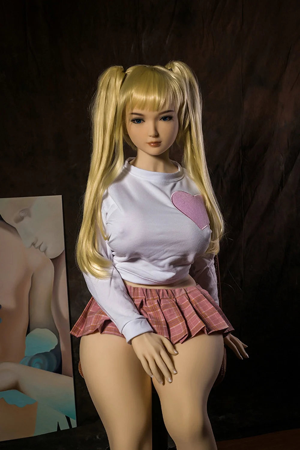 Anime sex doll sitting on a chair with hands between thighs