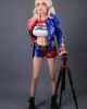 Anime sex doll with camera stand in hand