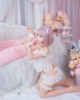 Anime sex doll with legs kneeling on the ground