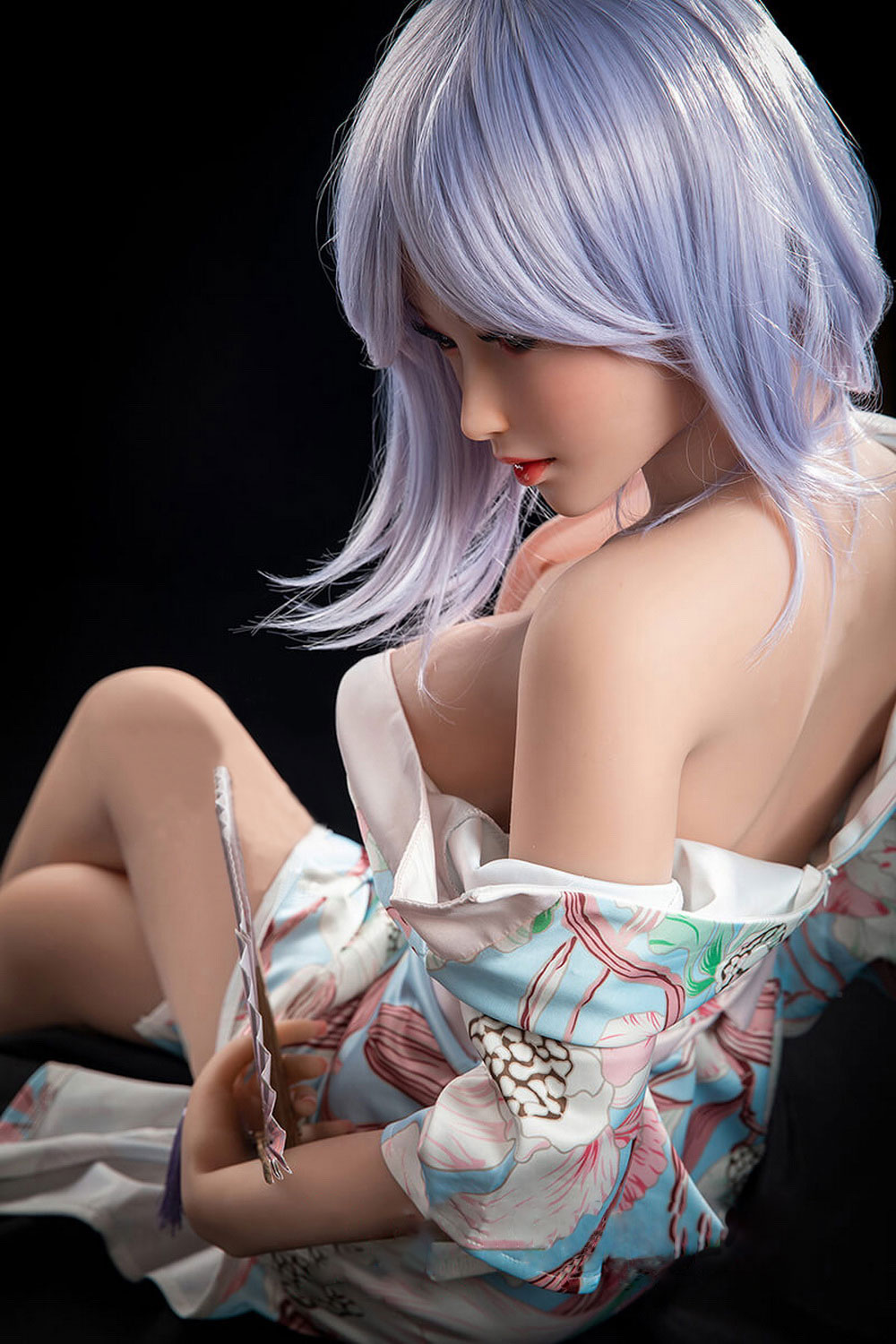 The anime sex doll that pulls down his clothes and reveals his shoulders