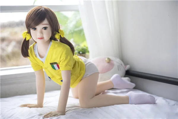 <strong>Can Sex Doll Blowjobs Be Better Than Real Blowjobs?</strong><strong></strong> A mini sex doll crawling on the ground in white socks